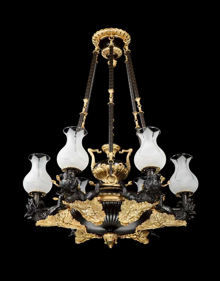 A Regency bronze and gilt metal six light argand chandelier